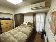 清楚なホワイトとシックなブラウンの調和が素敵な家　品川区S様邸